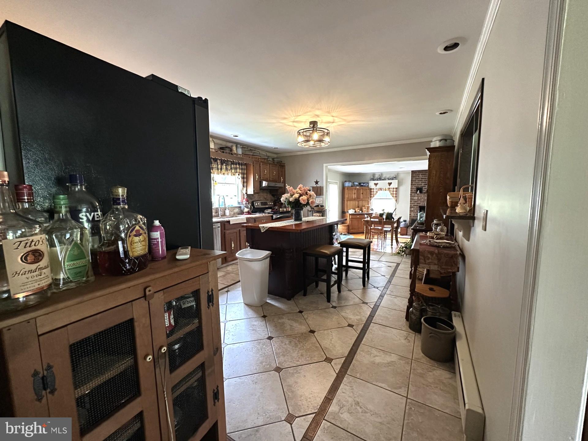 28402 Liden School Road Denton, MD 21629 - Photo 14 of 59 a kitchen with a sink appliances and cabinets