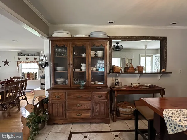a kitchen with a stove and a table