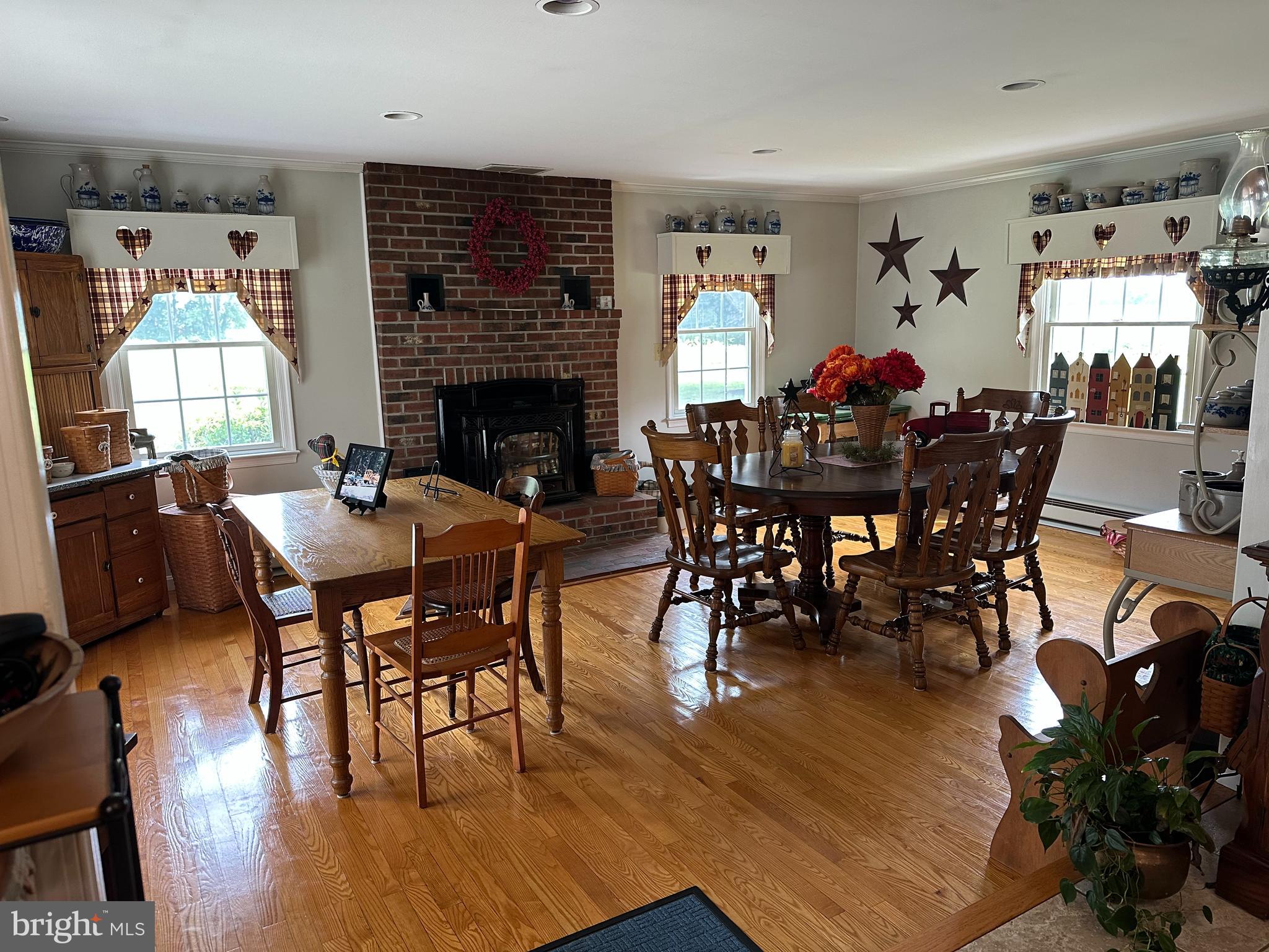28402 Liden School Road Denton, MD 21629 - Photo 29 of 59 a view of a dining room with furniture and wooden floor