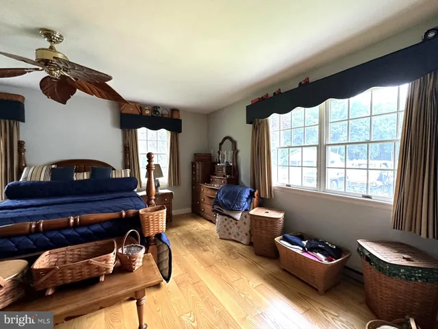 a bathroom with a toilet a sink and bathtub