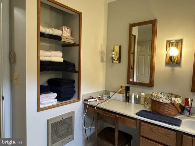 a view of a wooden deck with a small yard