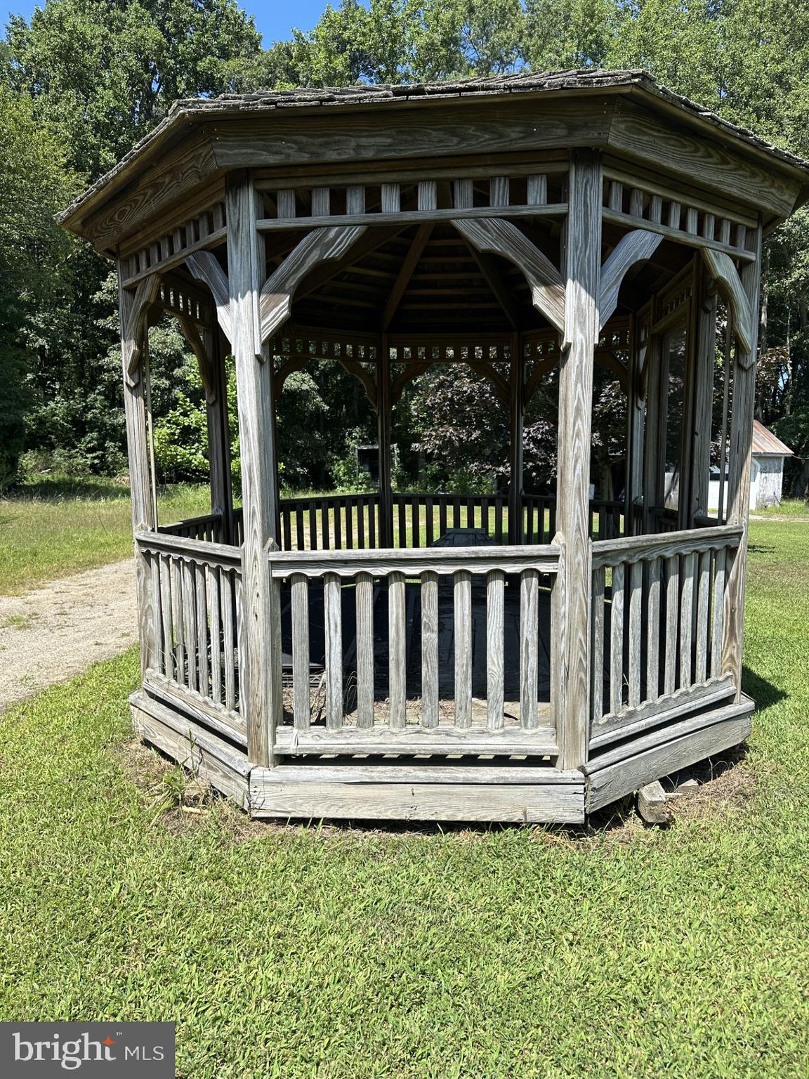 28402 Liden School Road Denton, MD 21629 - Photo 56 of 59 a view of a wooden deck with a small yard