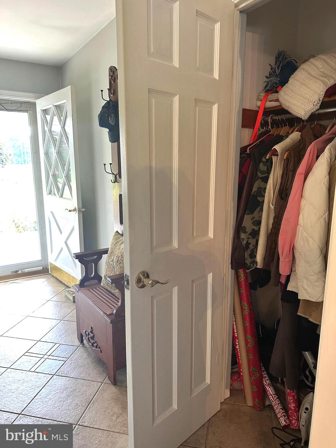 28402 Liden School Road Denton, MD 21629 - Photo 9 of 59 a view of walk in closet with clothes and shoes