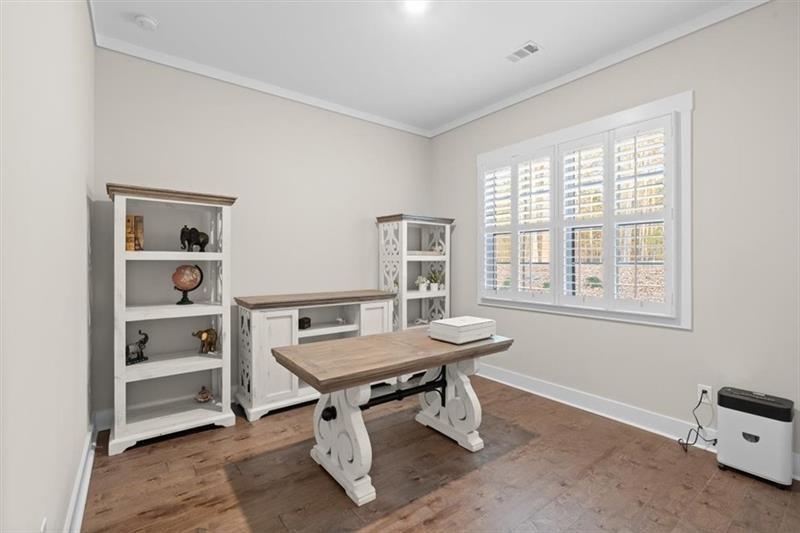283 London Road Ball Ground, GA 30107 - Photo 40 of 73 a view of a workspace with furniture and a window