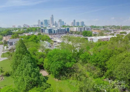 a view of a city with tall buildings
