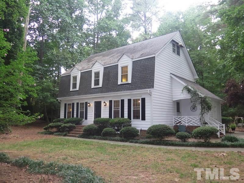 11501 Coachmans Way Raleigh, NC 27614 - Photo 1 of 20 a front view of a house with a yard