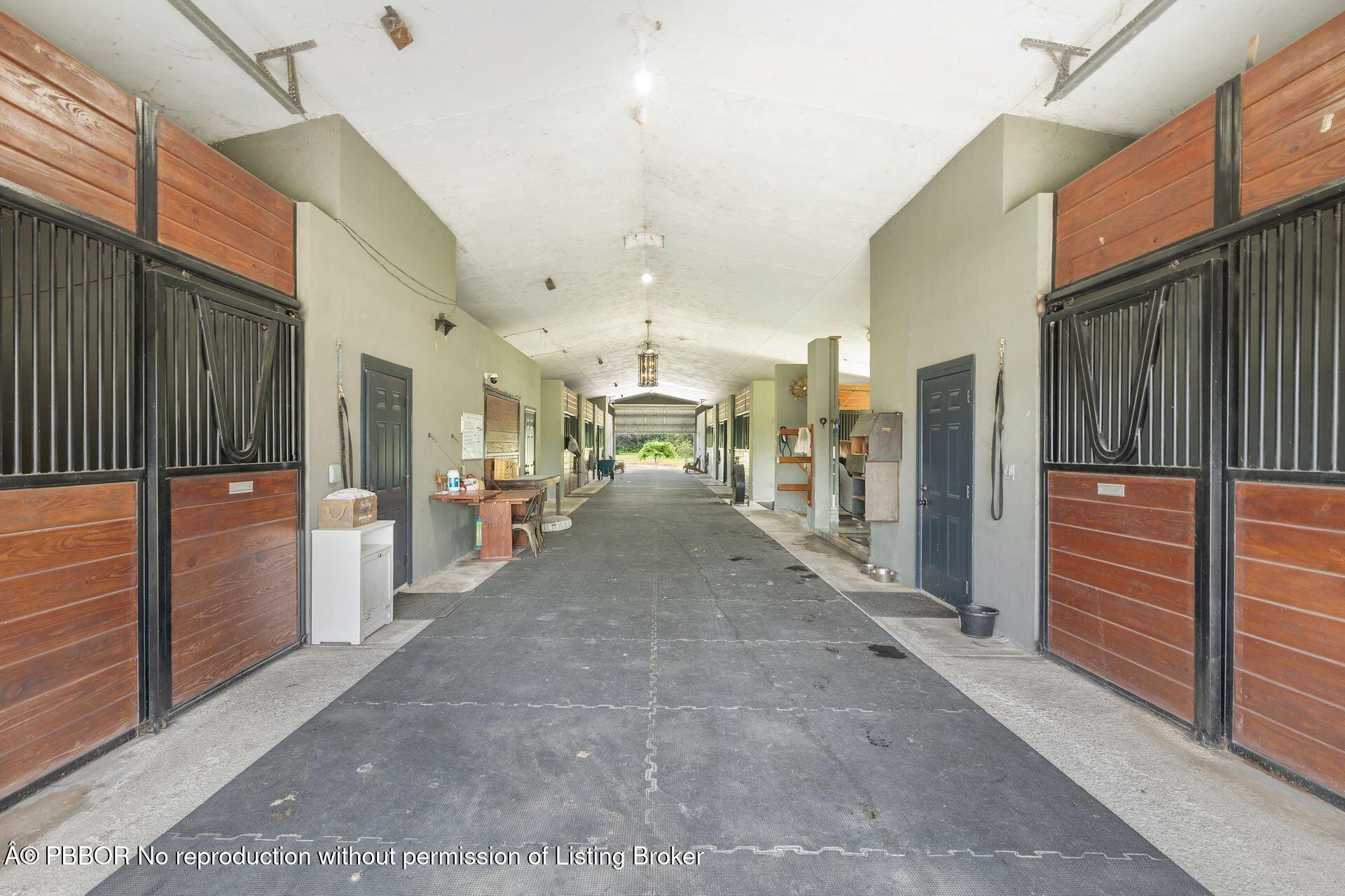 2770 E Road Loxahatchee, FL 33470 - Photo 8 of 51 a view of a hallway with seating area