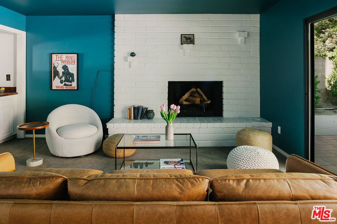 3122 Arrowhead Drive Los Angeles, CA 90068 - Photo 11 of 41 a living room with furniture and a mirror