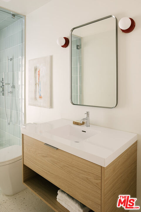 3122 Arrowhead Drive Los Angeles, CA 90068 - Photo 16 of 41 a bathroom with a sink and a mirror