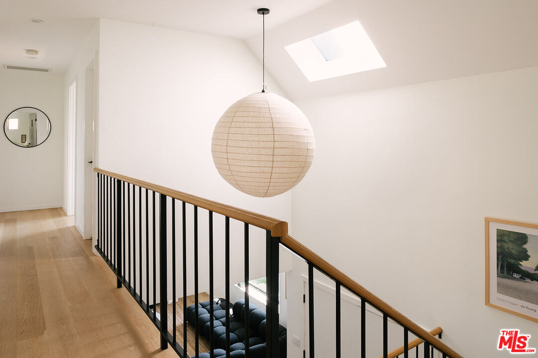 3122 Arrowhead Drive Los Angeles, CA 90068 - Photo 18 of 41 a view of a hallway with wooden floor