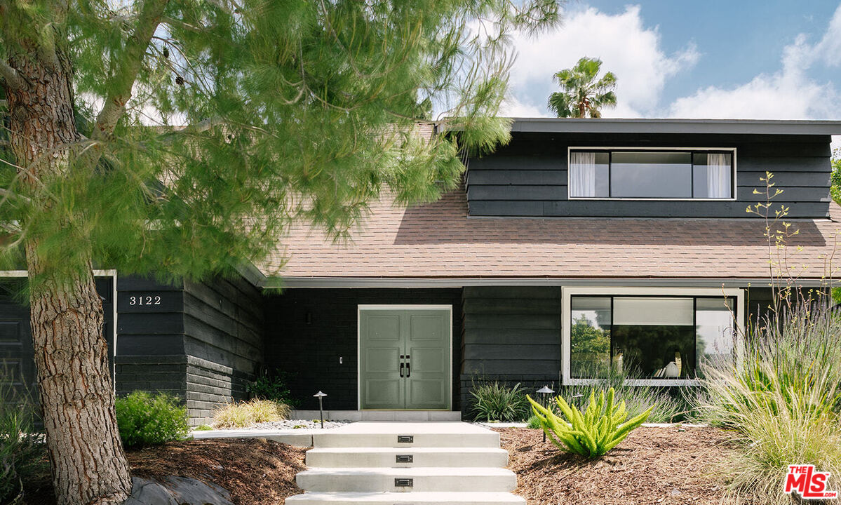 3122 Arrowhead Drive Los Angeles, CA 90068 - Photo 2 of 41 a front view of a house with a garden
