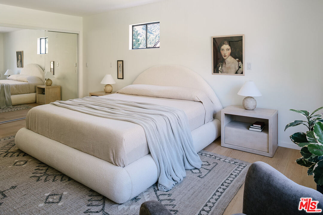 3122 Arrowhead Drive Los Angeles, CA 90068 - Photo 22 of 41 a bedroom with a bed and a couch