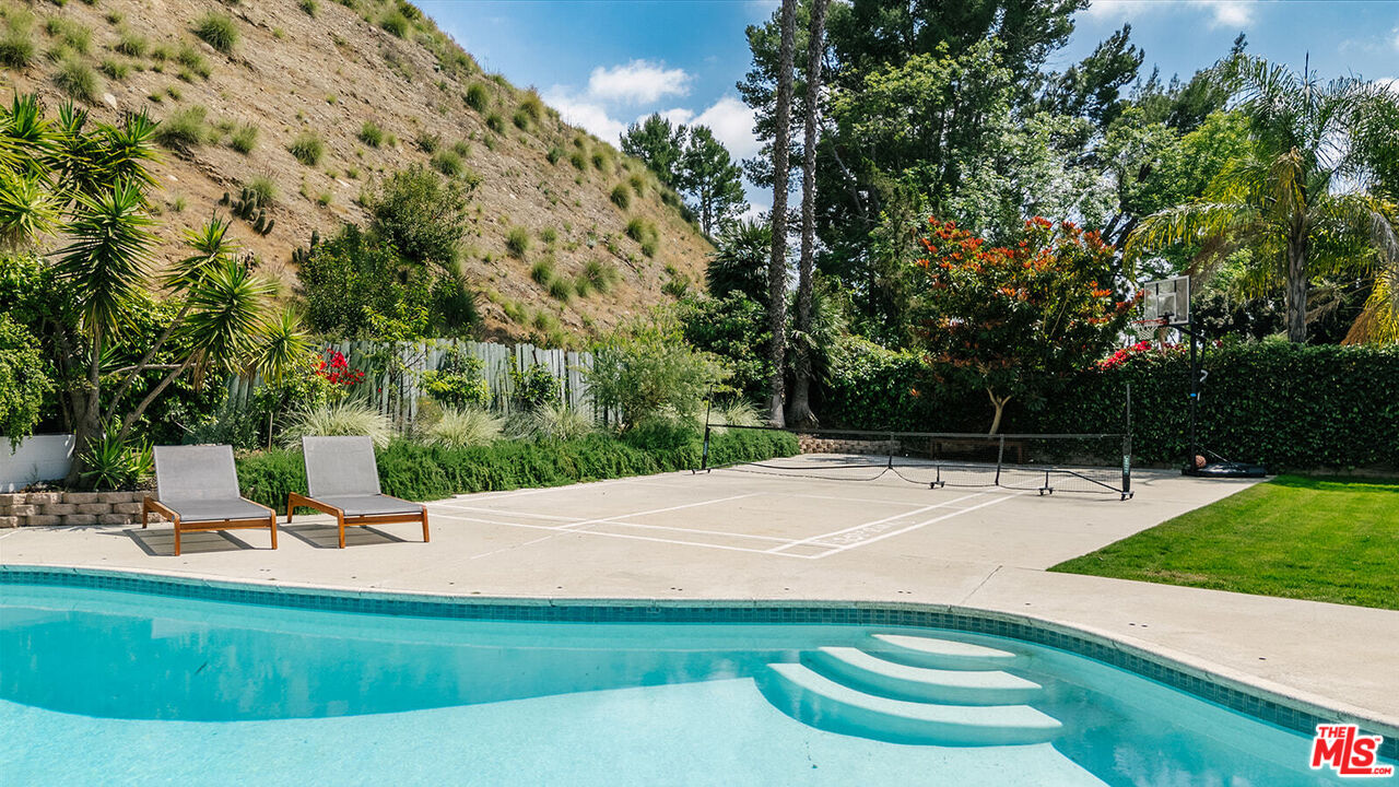 3122 Arrowhead Drive Los Angeles, CA 90068 - Photo 37 of 41 a view of a swimming pool with a patio