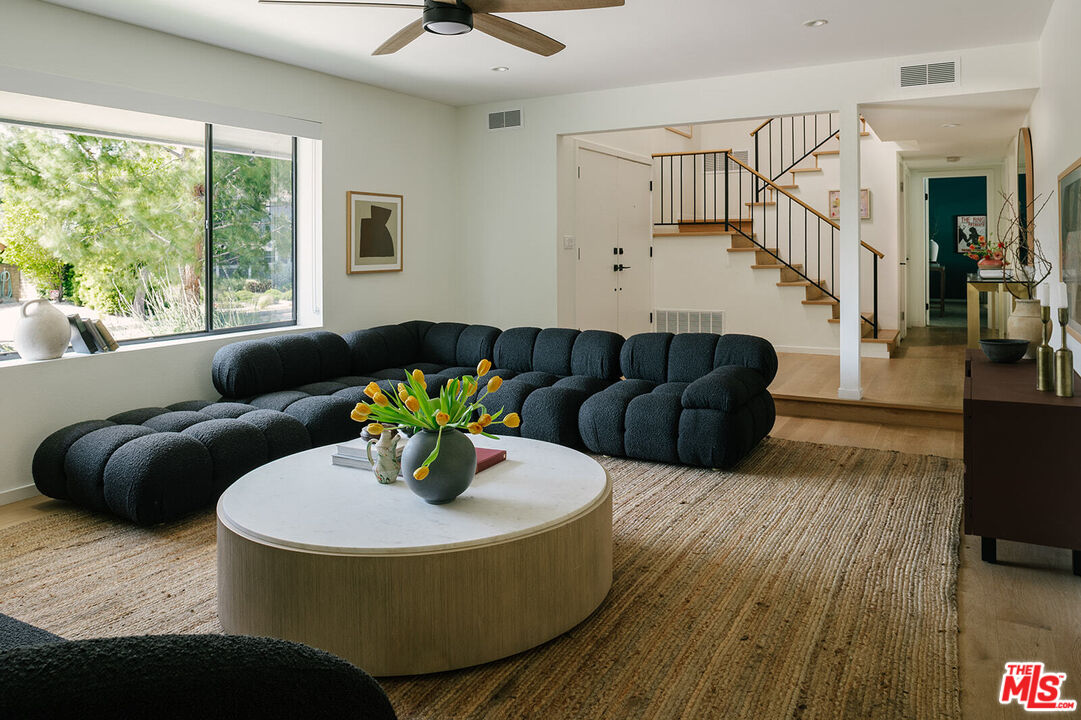 3122 Arrowhead Drive Los Angeles, CA 90068 - Photo 4 of 41 a living room with furniture and a floor to ceiling window