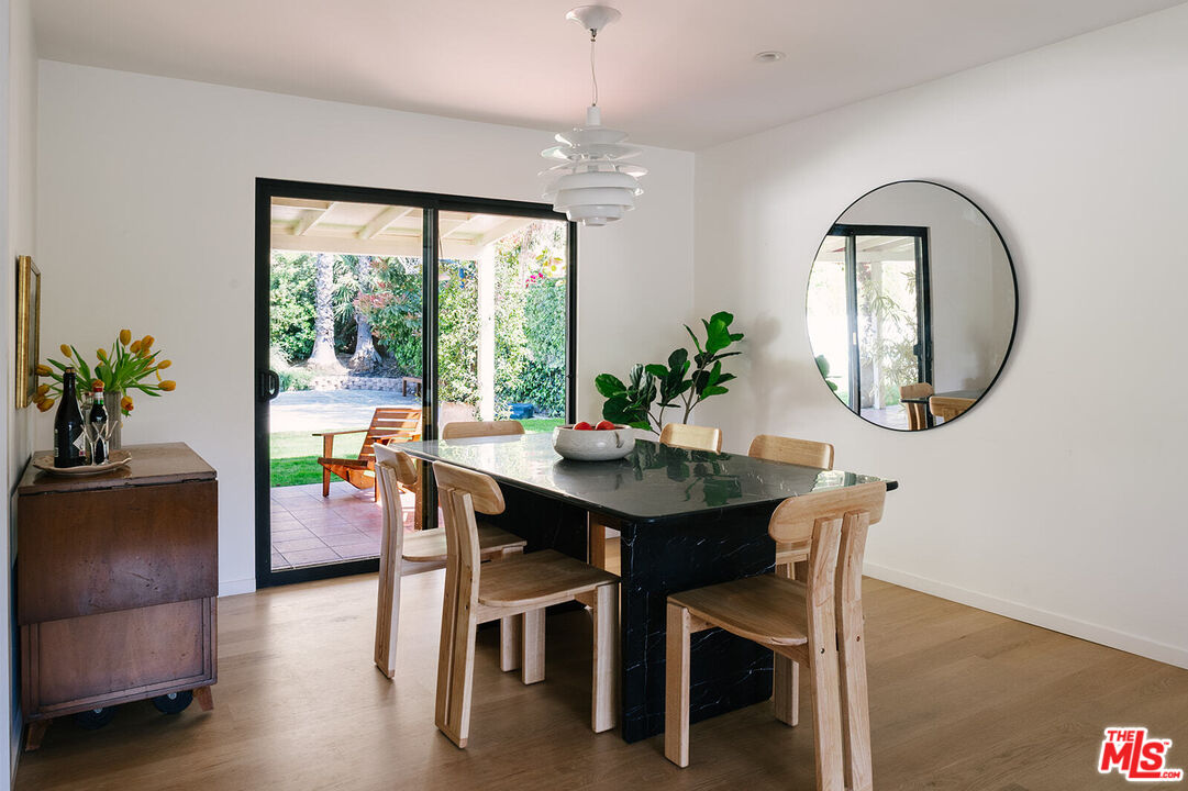 3122 Arrowhead Drive Los Angeles, CA 90068 - Photo 6 of 41 a dining room with furniture and a potted plant