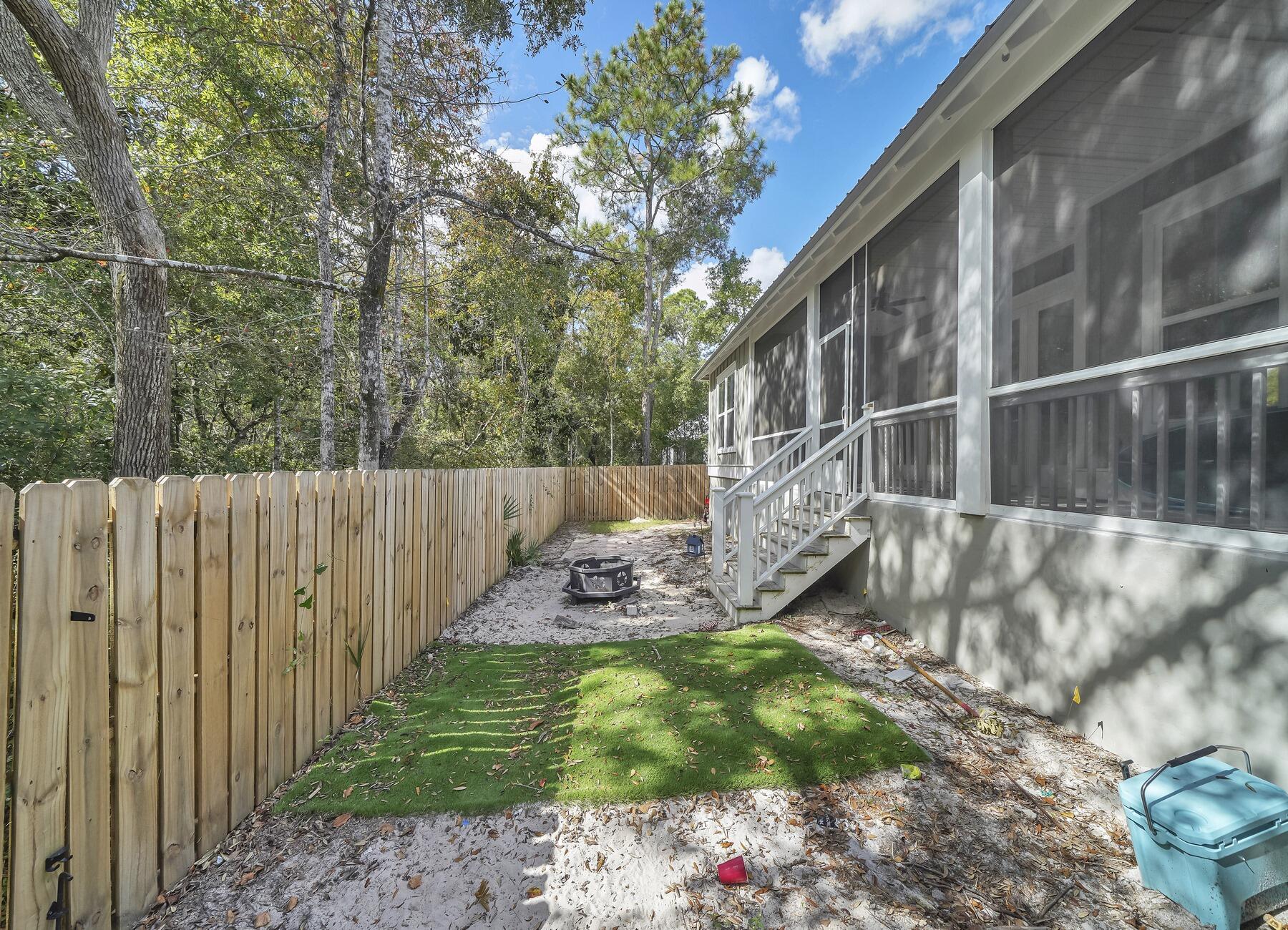 15 Hibernate Way Freeport, FL 32439 - Photo 16 of 38 a view of yard with wooden fence