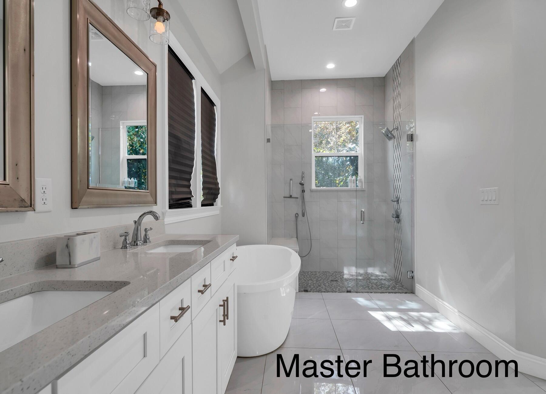 15 Hibernate Way Freeport, FL 32439 - Photo 23 of 38 a bathroom with a sink a toilet and shower