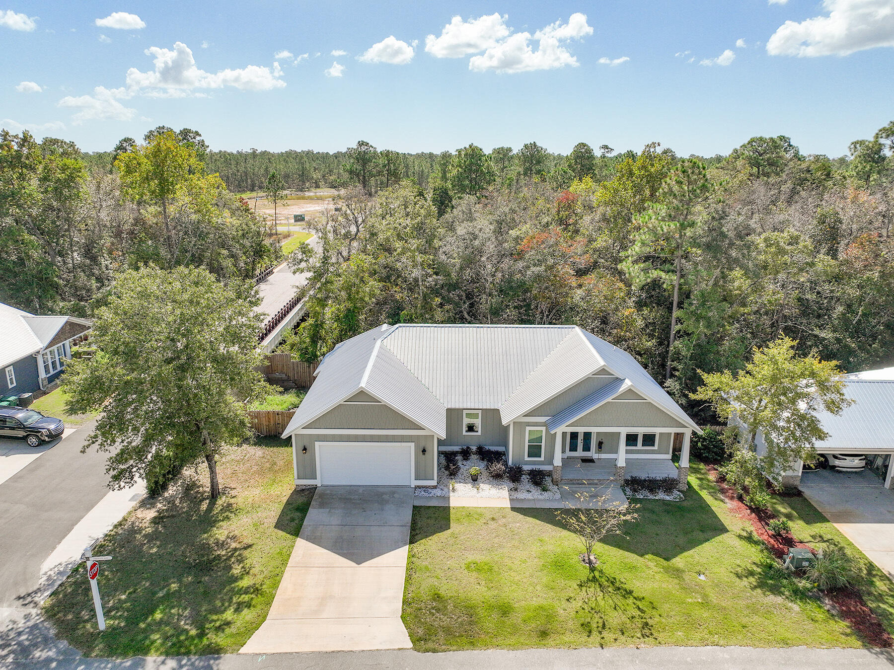15 Hibernate Way Freeport, FL 32439 - Photo 3 of 38 an aerial view of a house with swimming pool and mountains