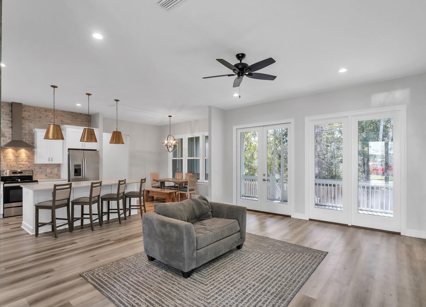 15 Hibernate Way Freeport, FL 32439 - Photo 7 of 38 a living room with furniture and a wooden floor
