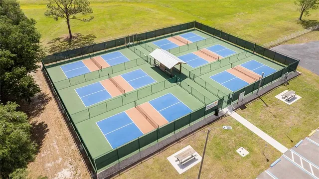 an aerial view of a house with a ocean view