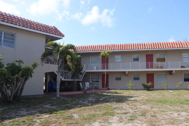 1798 Northwest 15th Vista, Unit 5 Boca Raton, FL 33432 - Photo 4 of 15 a view of a house with a garden