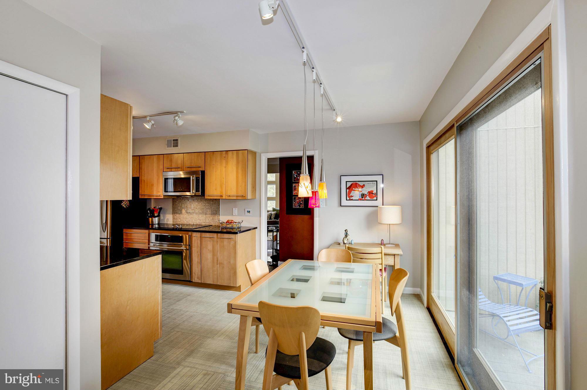 2472 Freetown Drive Reston, VA 20191 - Photo 11 of 30 Breakfast Area w/ walk-out to deck