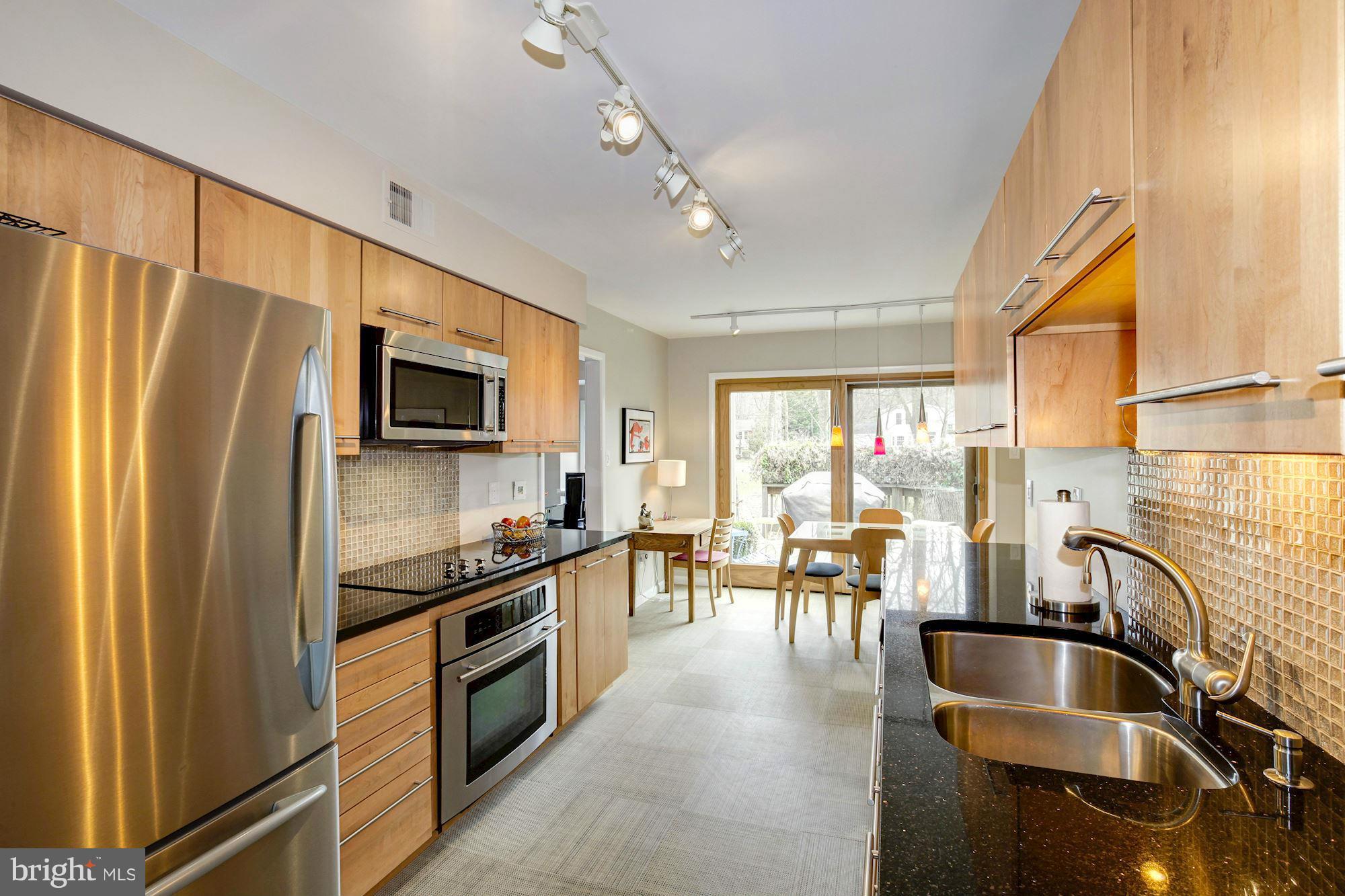 2472 Freetown Drive Reston, VA 20191 - Photo 6 of 30 Gorgeous kitchen walks out to one of several decks