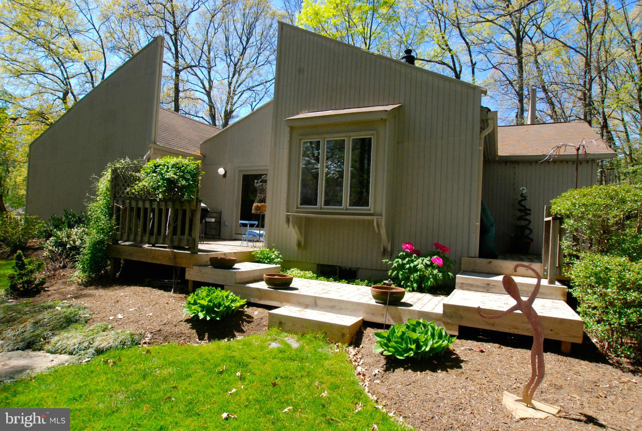 2472 Freetown Drive Reston, VA 20191 - Photo 8 of 30 Multi-tiered decking and custom landscapes
