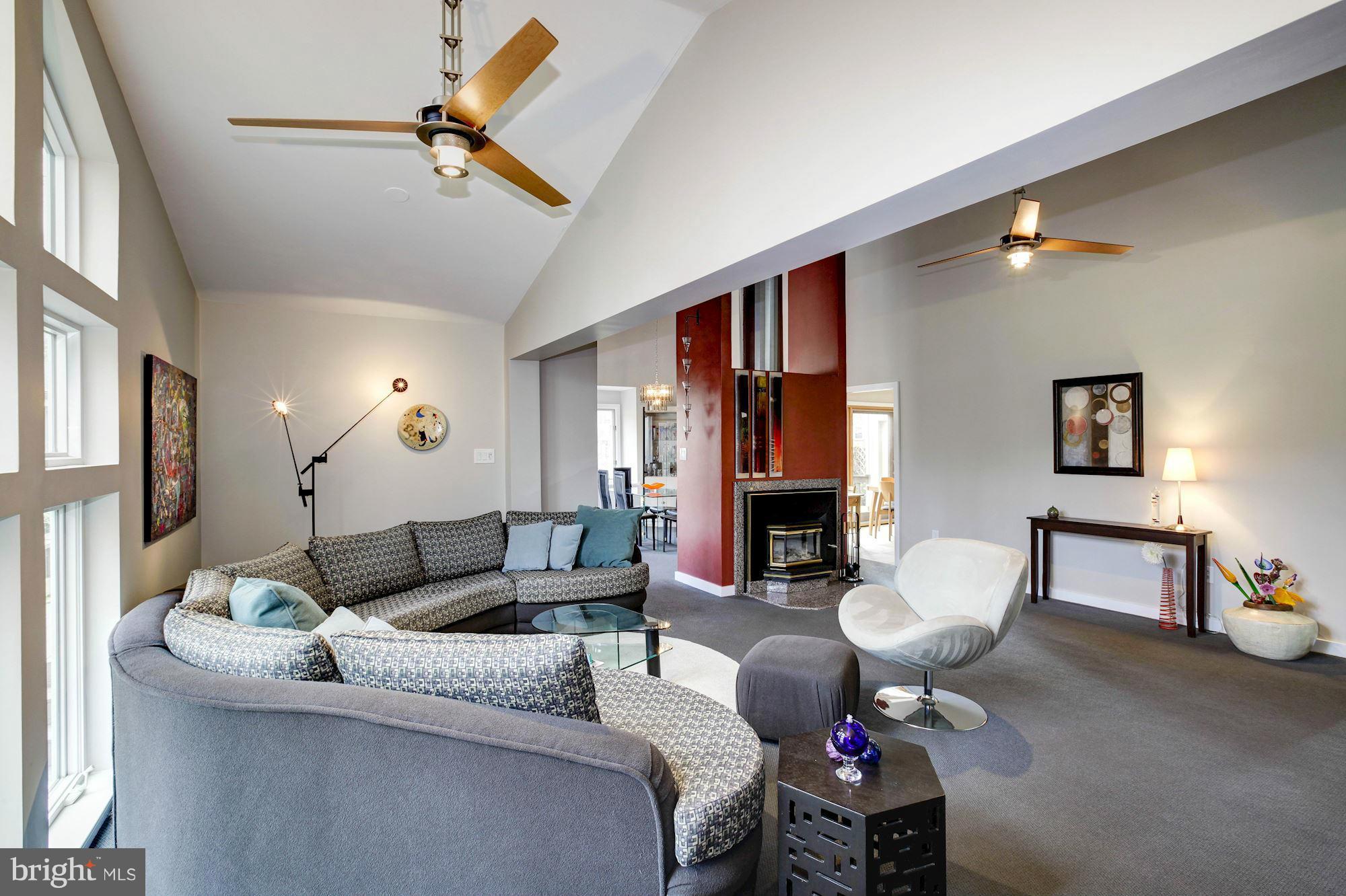 2472 Freetown Drive Reston, VA 20191 - Photo 10 of 30 8 foot extended living room with a wall of windows