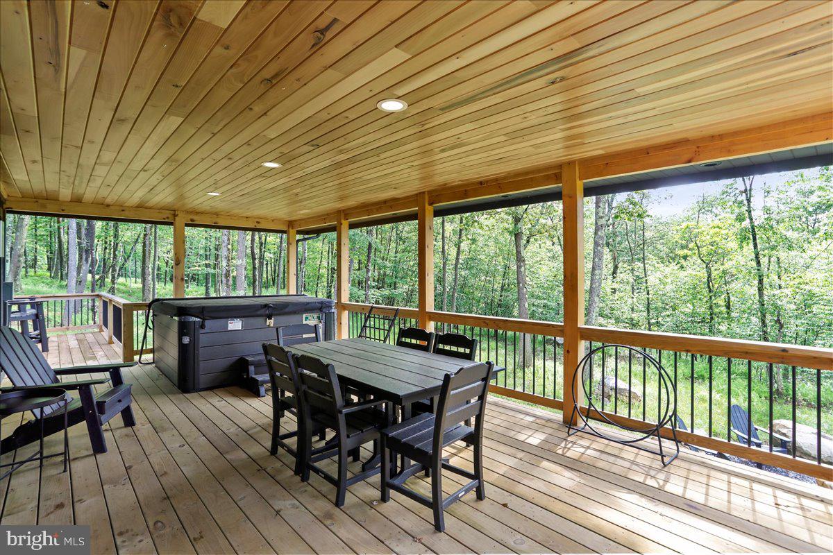 130 Lodestone Way Oakland, MD 21550 - Photo 20 of 47 a view of a patio with furniture and wooden floor