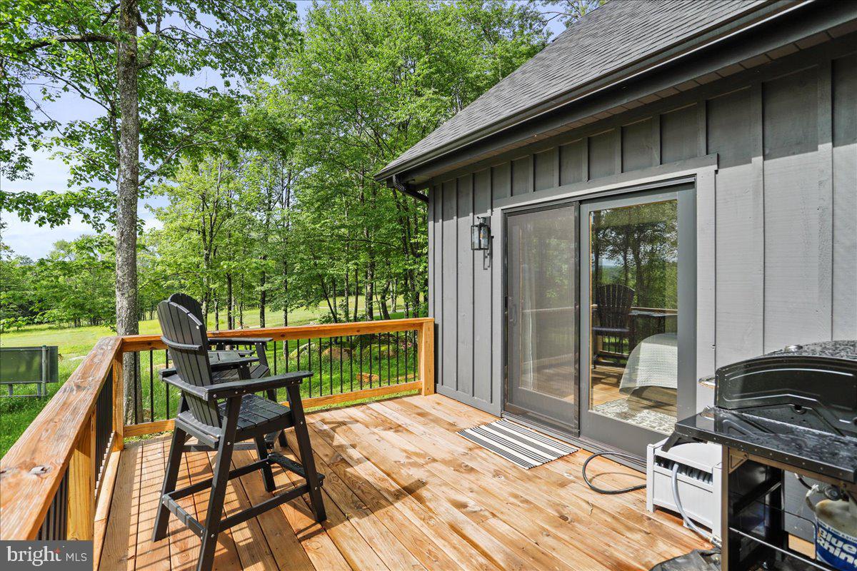 130 Lodestone Way Oakland, MD 21550 - Photo 24 of 47 a deck view with a seating space