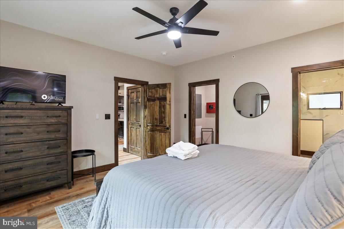 130 Lodestone Way Oakland, MD 21550 - Photo 27 of 47 a bedroom with a bed and a mirror on the dresser