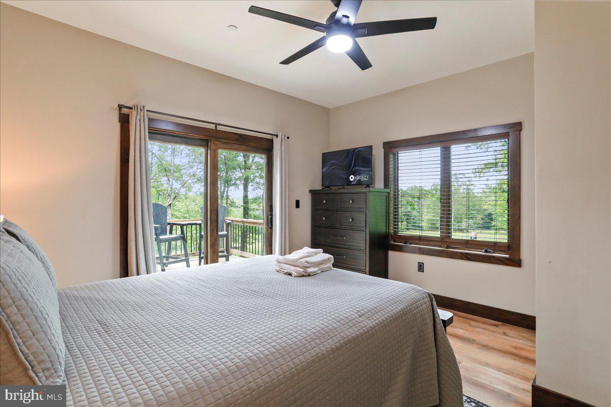 130 Lodestone Way Oakland, MD 21550 - Photo 29 of 47 a bedroom with a large bed and a window