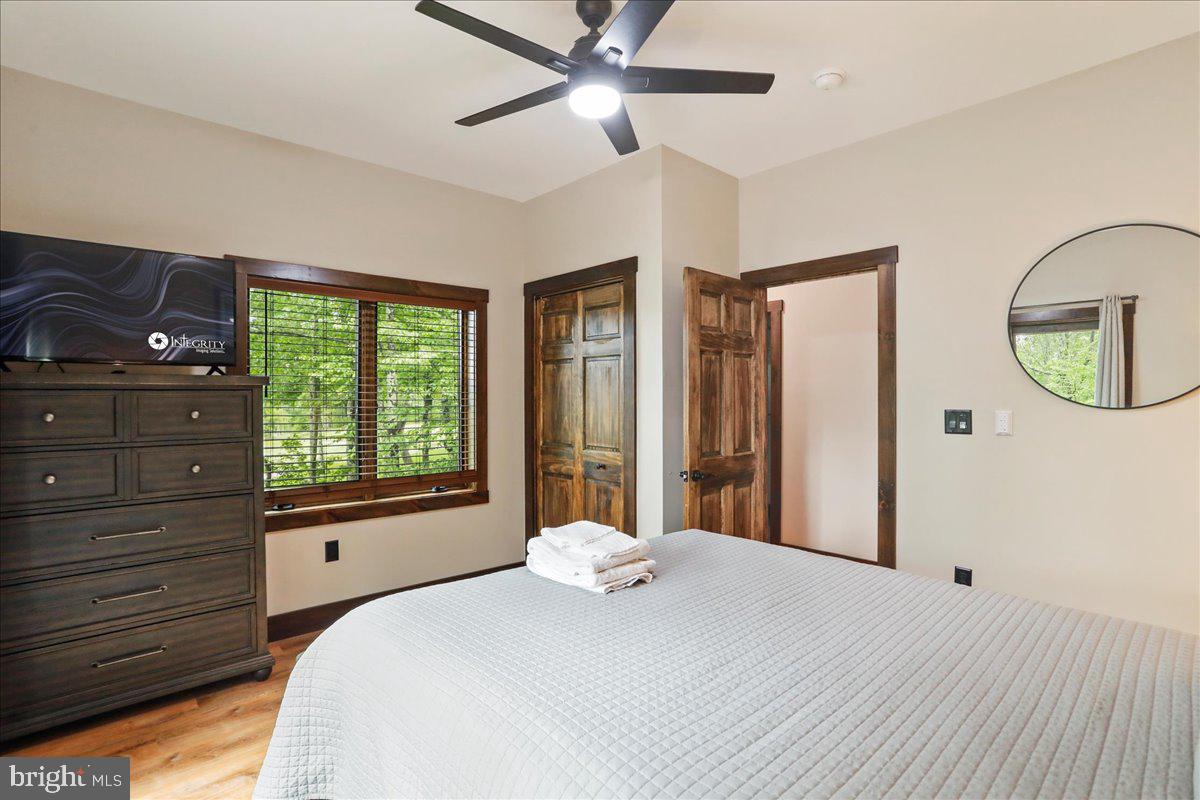 130 Lodestone Way Oakland, MD 21550 - Photo 30 of 47 a bedroom with a large bed and a window