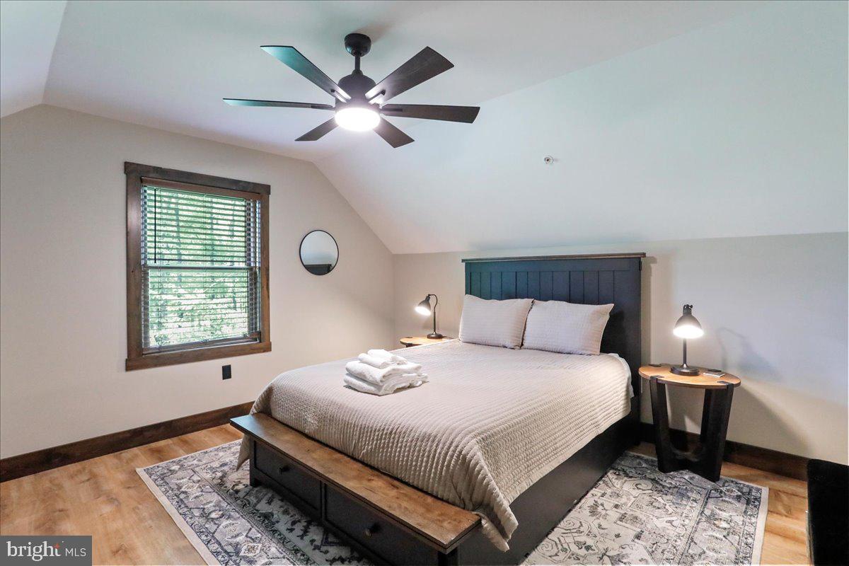 130 Lodestone Way Oakland, MD 21550 - Photo 33 of 47 a bedroom with a large bed and a window