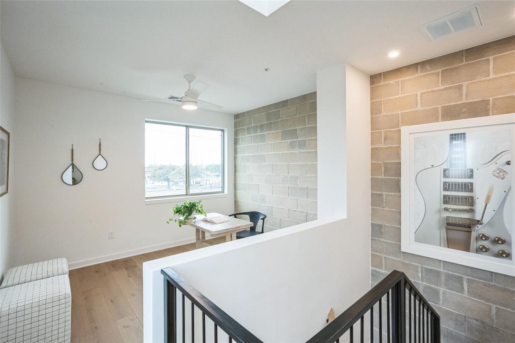 700 Denson Drive, Unit 1102 Austin, TX 78752 - Photo 10 of 30 a view of kitchen with furniture and window
