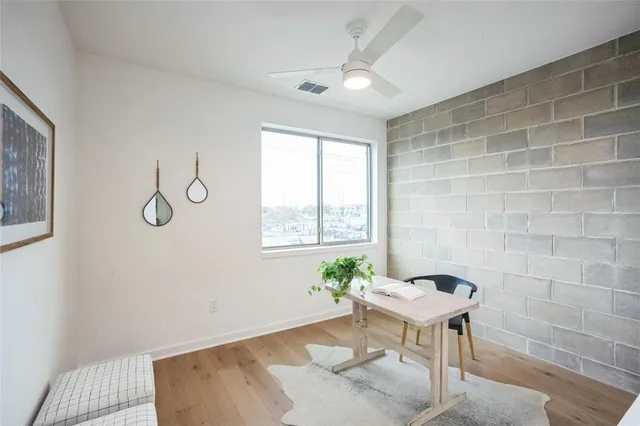 a view of kitchen with furniture and window