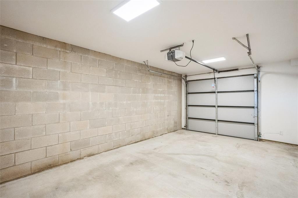 700 Denson Drive, Unit 1102 Austin, TX 78752 - Photo 20 of 30 a view of a garage
