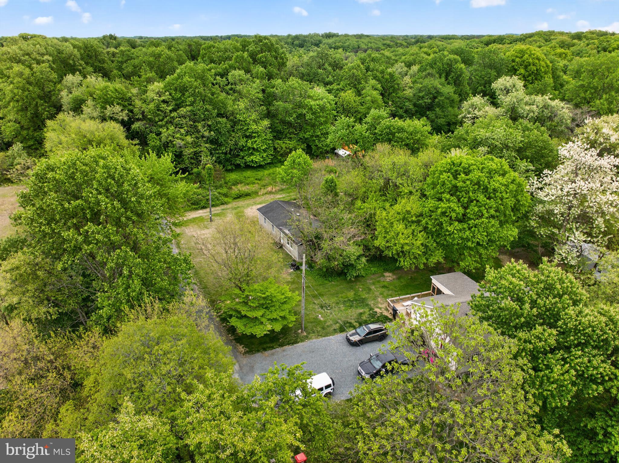 26765 Dutchtown Road Still Pond, MD 21667 - Photo 9 of 15 an aerial view of residential house with outdoor space and trees all around