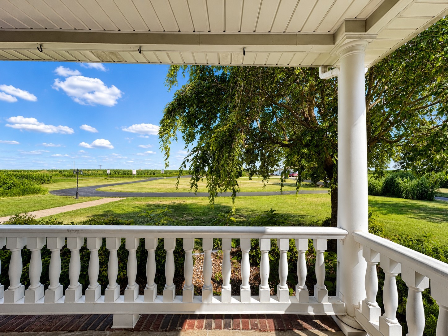 10814 Clarksville Road Olmstead, KY 42265 - Photo 5 of 55 a view of a wooden deck with a yard