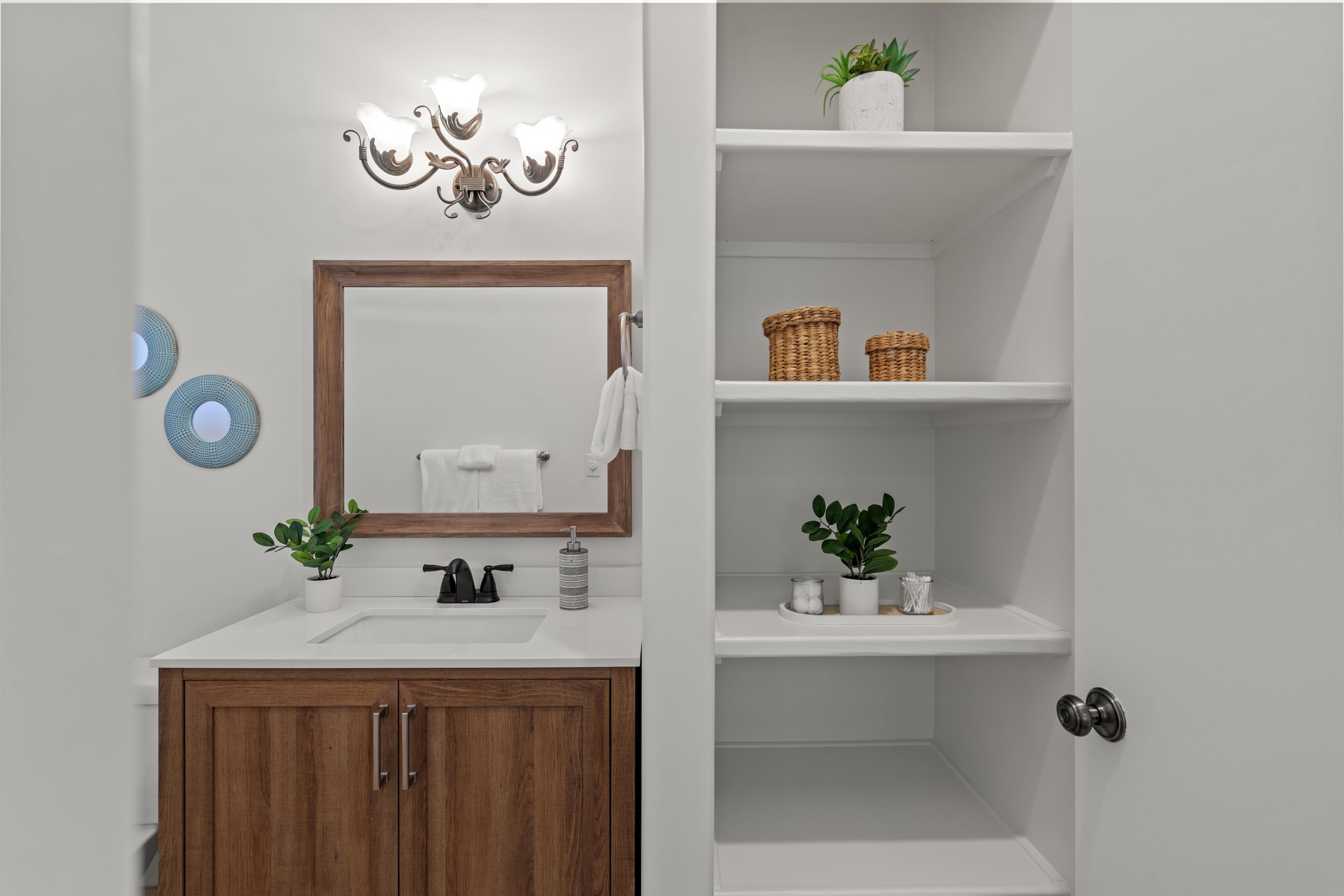 60 East Huapala Place, Unit B Lahaina, HI 96761 - Photo 16 of 50 a bathroom with a sink and a mirror