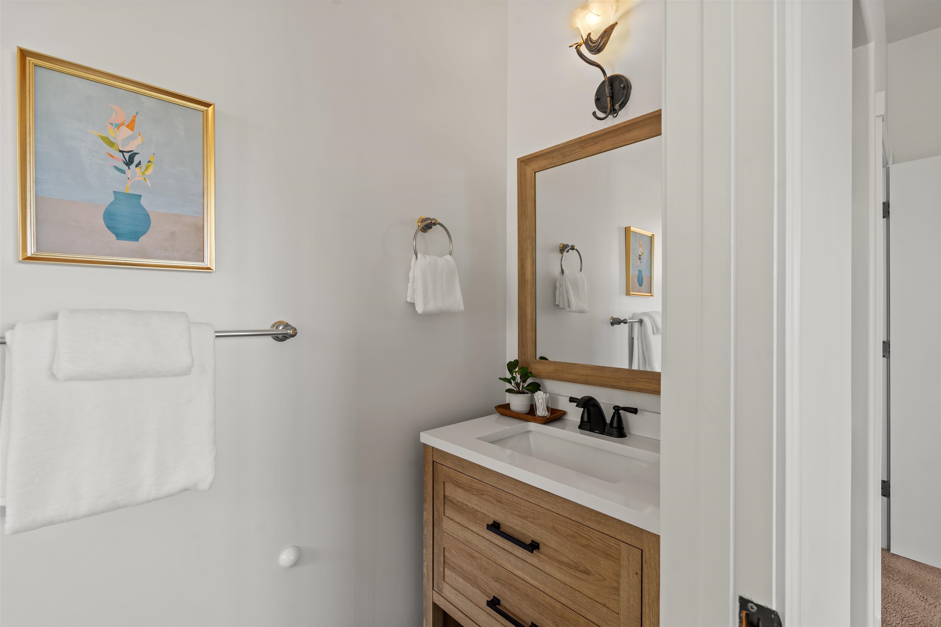 60 East Huapala Place, Unit B Lahaina, HI 96761 - Photo 20 of 50 a bathroom with a sink and a mirror
