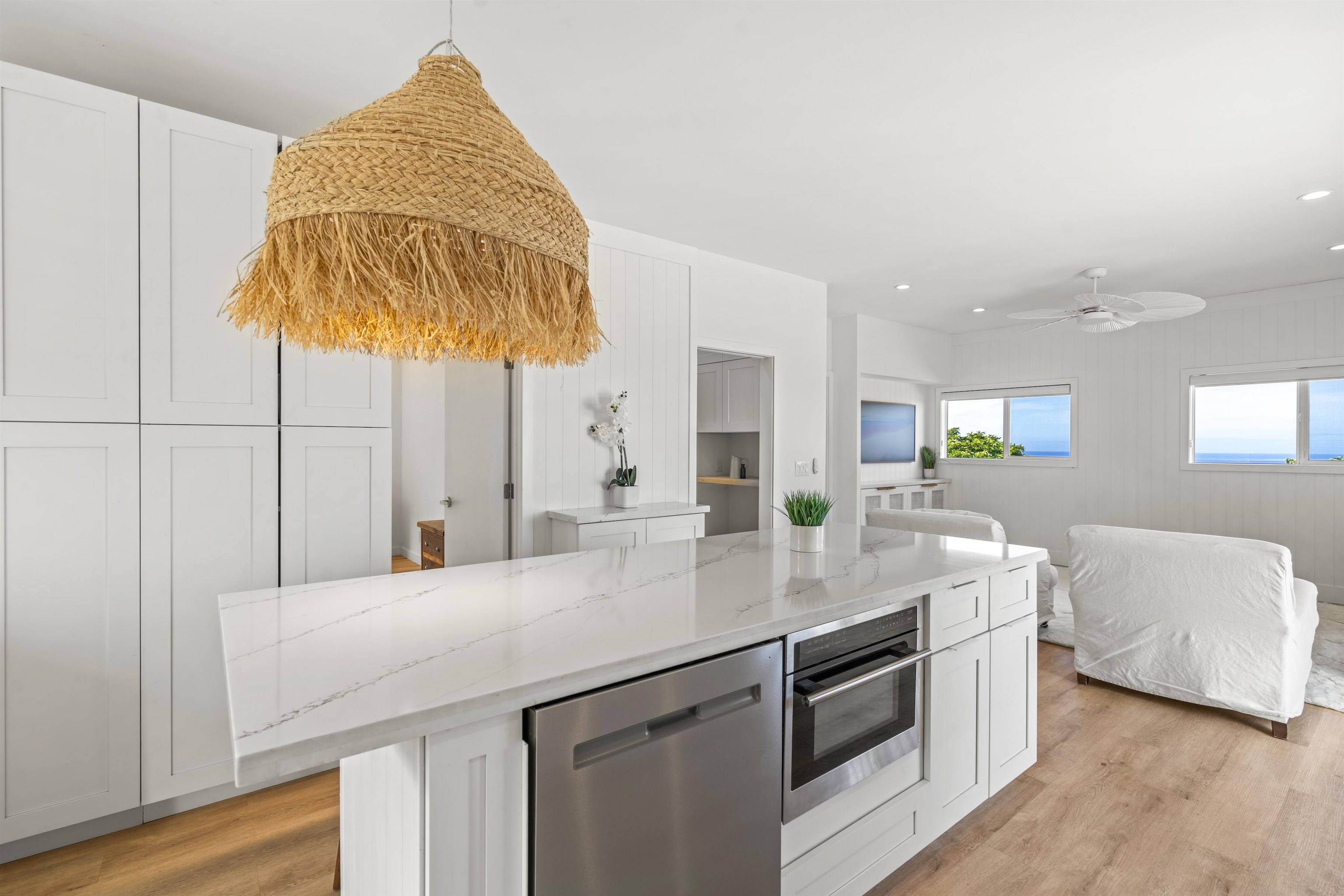 60 East Huapala Place, Unit B Lahaina, HI 96761 - Photo 38 of 50 a kitchen with stainless steel appliances granite countertop a sink and cabinets