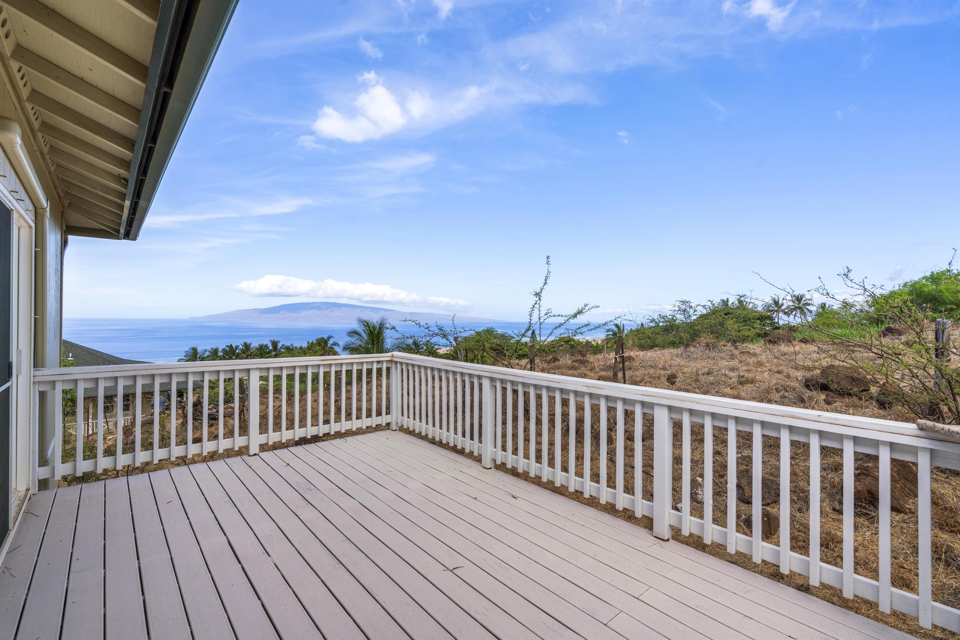 60 East Huapala Place, Unit B Lahaina, HI 96761 - Photo 39 of 50 a view of balcony with wooden floor