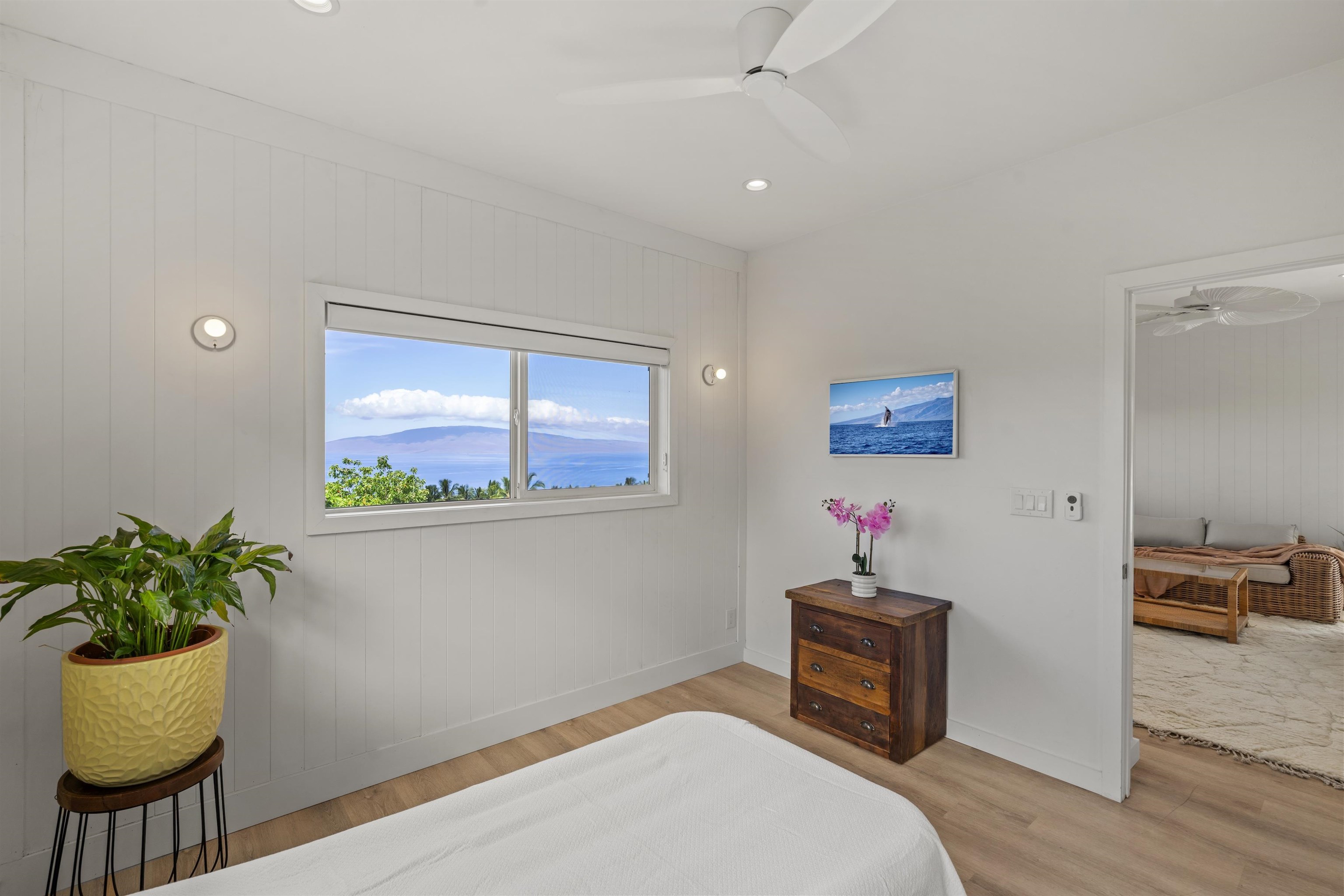 60 East Huapala Place, Unit B Lahaina, HI 96761 - Photo 47 of 50 a bed room with a bed and a window