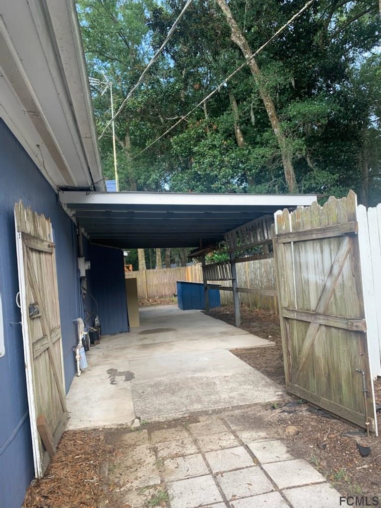 117 Queen Road St. Augustine, FL 32086 - Photo 6 of 16 a view of a porch