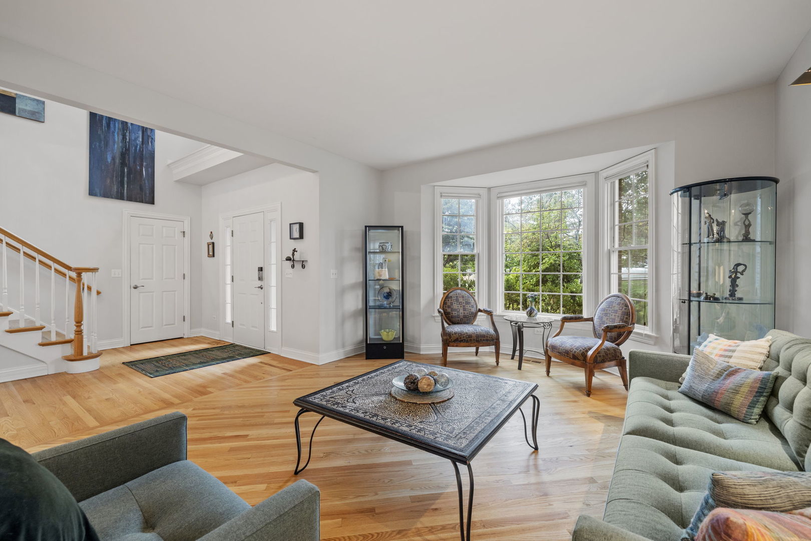 3855 Glendenning Road Downers Grove, IL 60515 - Photo 5 of 39 a living room with furniture and a table