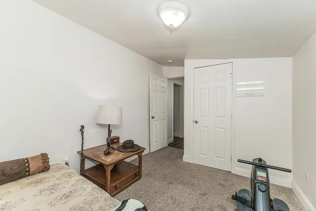a living room with a couch and a table