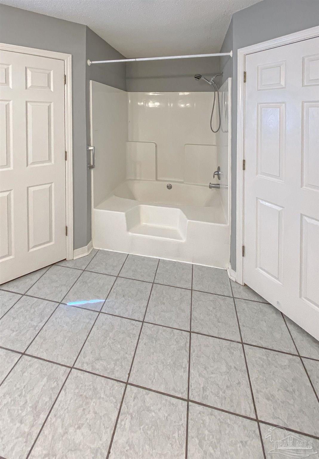 12611 Meadson Road Pensacola, FL 32506 - Photo 14 of 22 a bathroom with a shower