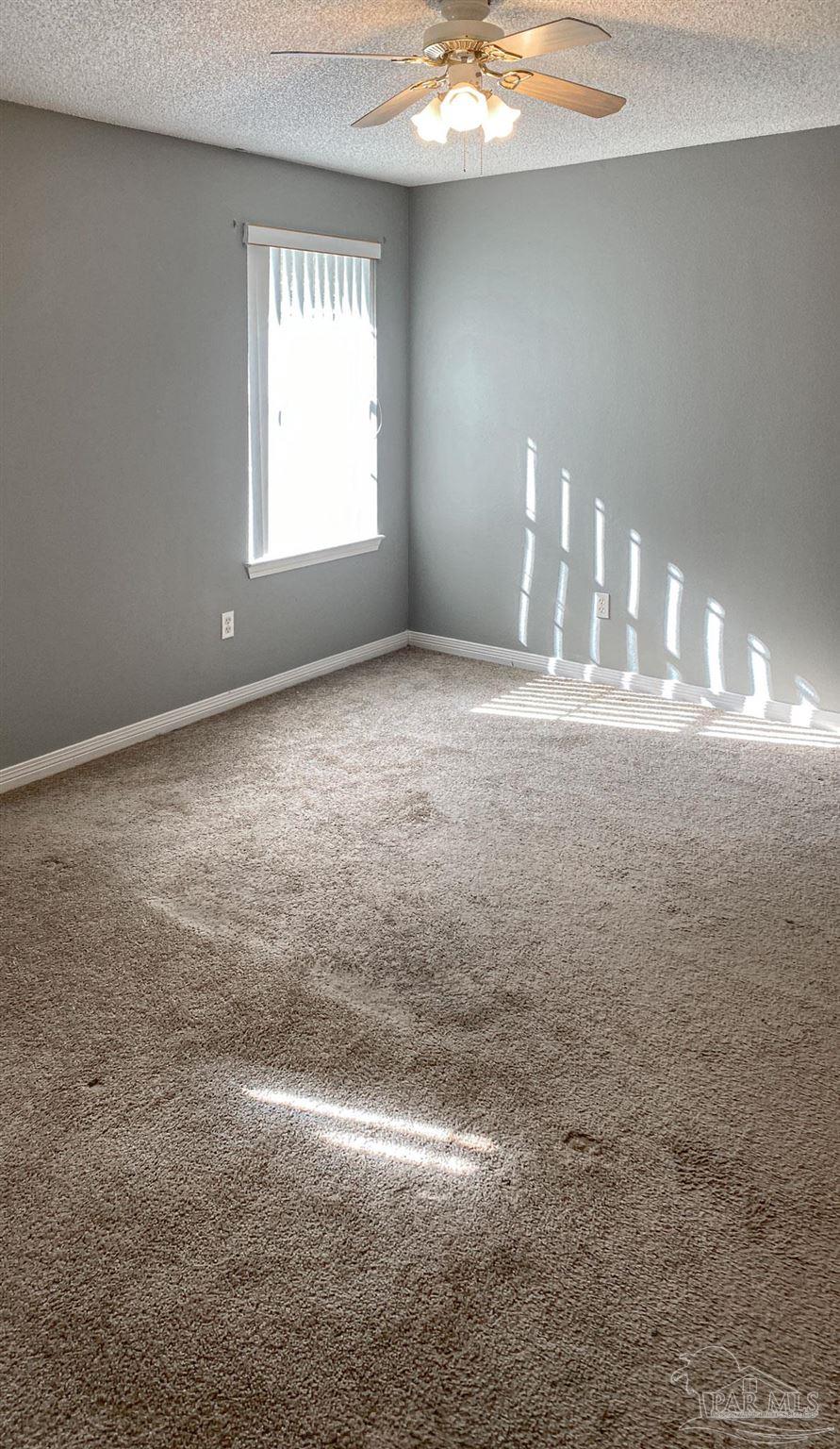 12611 Meadson Road Pensacola, FL 32506 - Photo 15 of 22 a view of empty room with window
